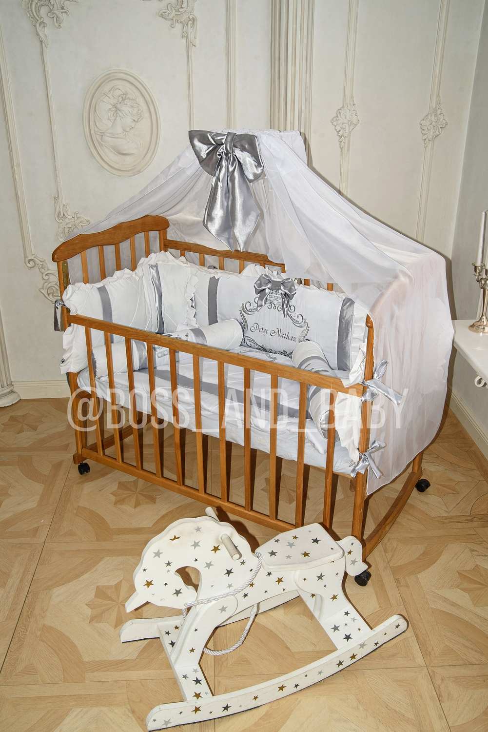 Close-up of a chic nursery bedding set with a sophisticated, simple design.
