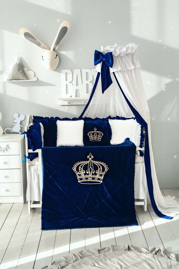 A complete crib bedding set with the matching blanket