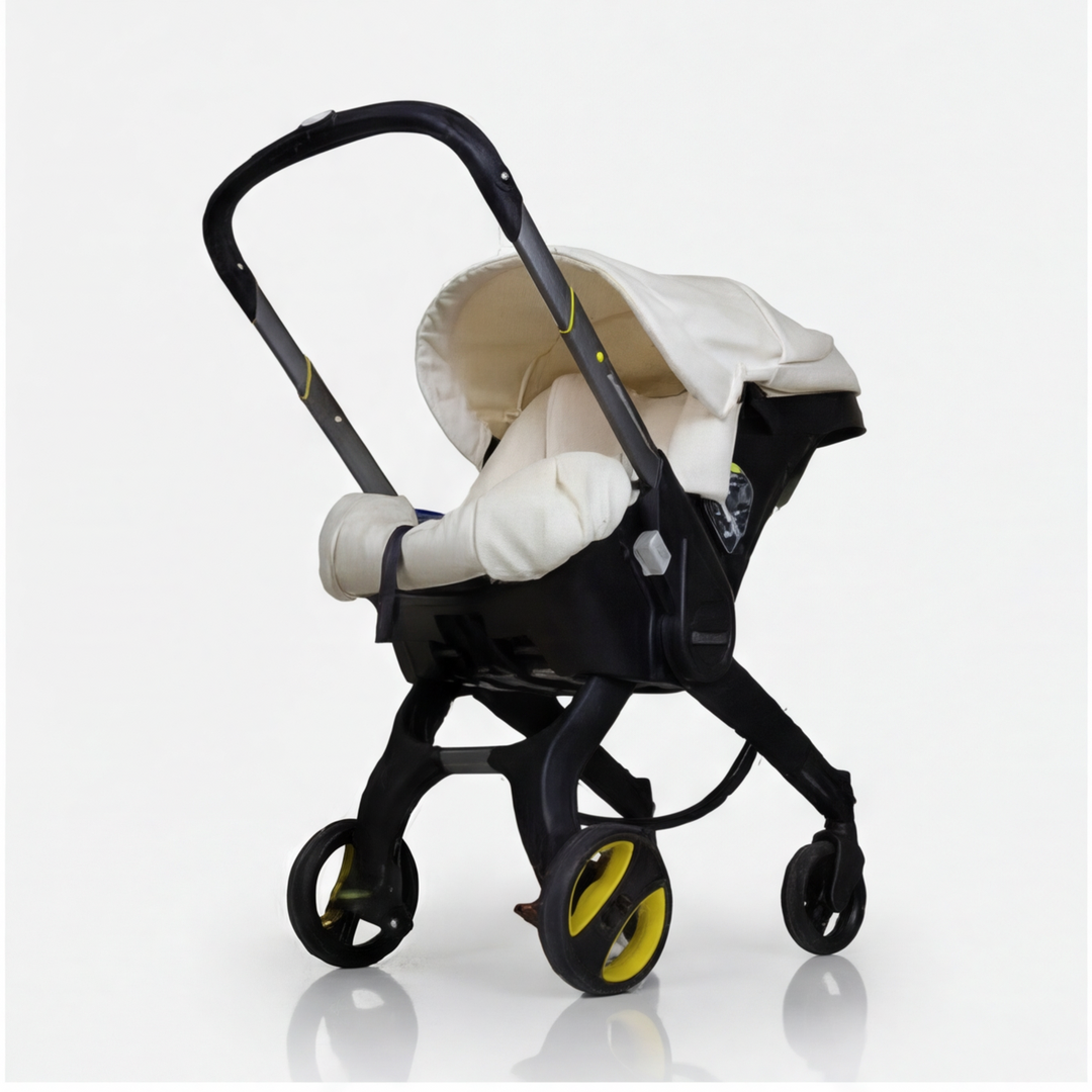 Low angle view of beige world map cover set installed on Doona + car seat.