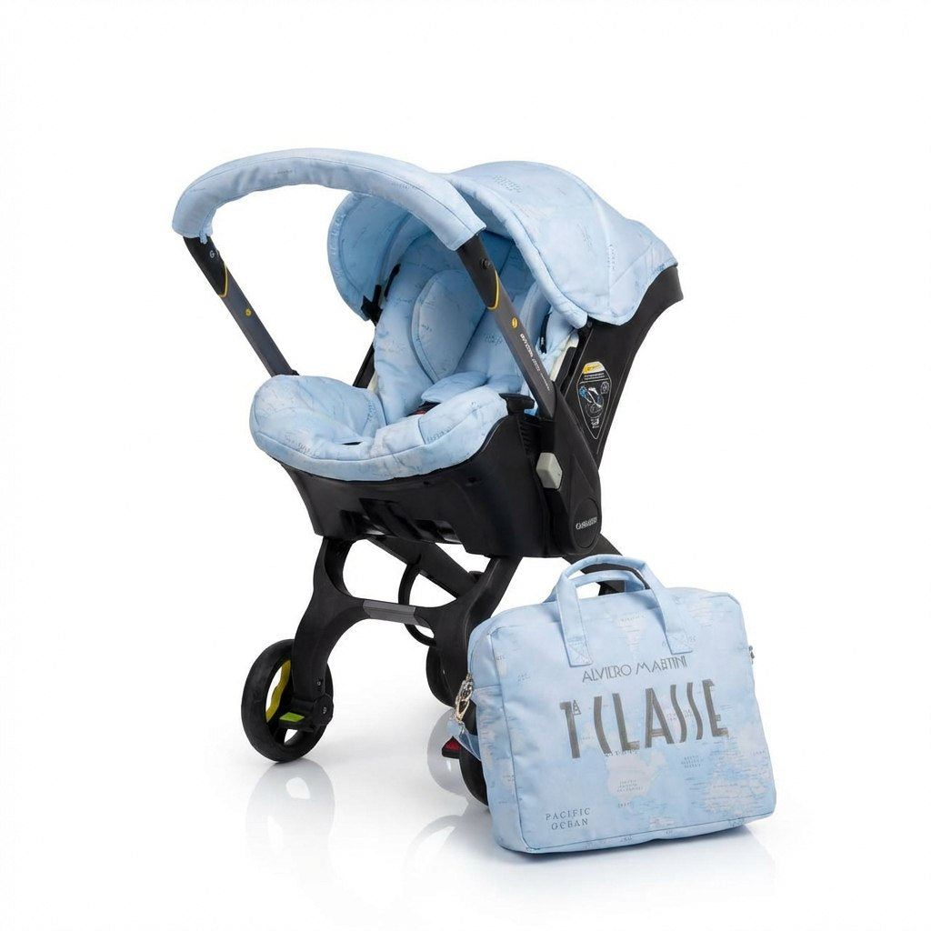 Premium light blue stroller cover set with world map pattern, quilted canopy and seat cover, paired with a matching diaper bag featuring custom embroidery.