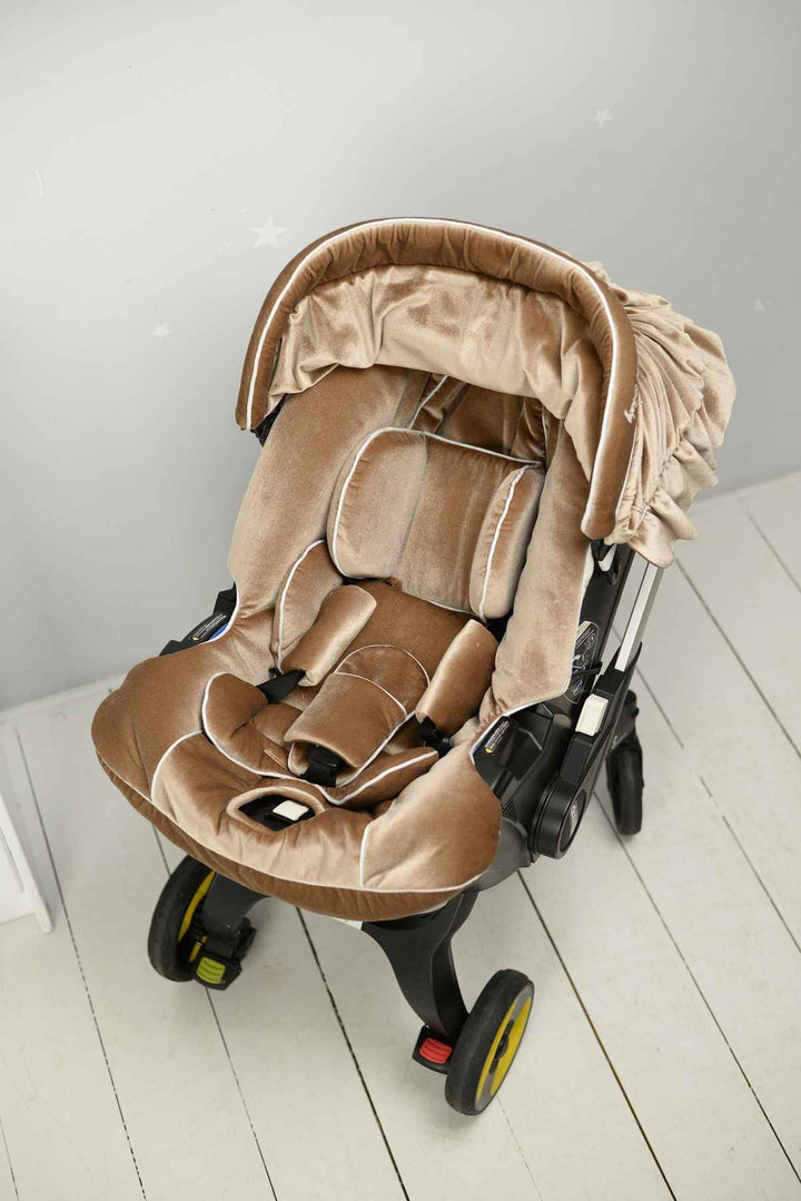 Soft and breathable beige car seat cover with rhinestones for toddlers