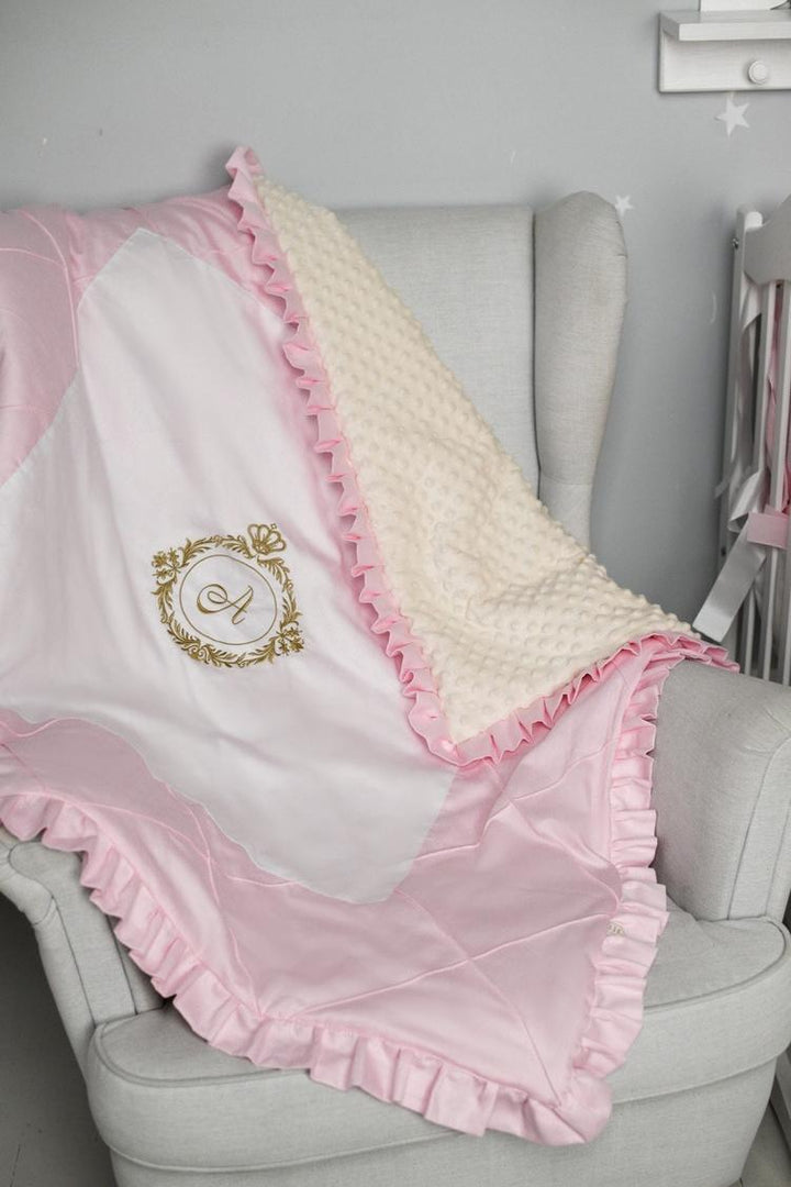Soft, breathable crib bedding set for baby girl with pink accents