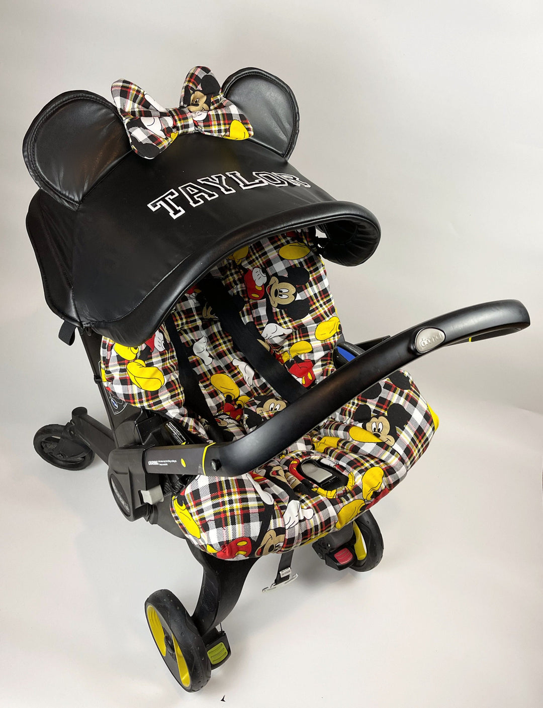 Personalized Checkered Doona Car Seat Cover for Baby Girls with Faux Leather Canopy and Mickey Mouse Print Overlay