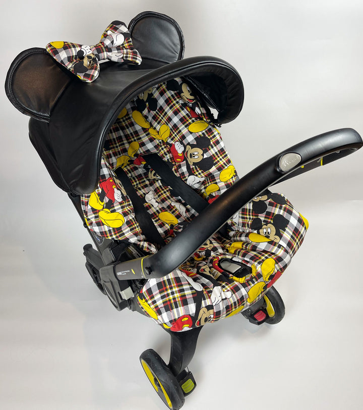Funda de asiento de coche Doona a cuadros personalizada para niñas con dosel de piel sintética y superposición con estampado de Mickey Mouse