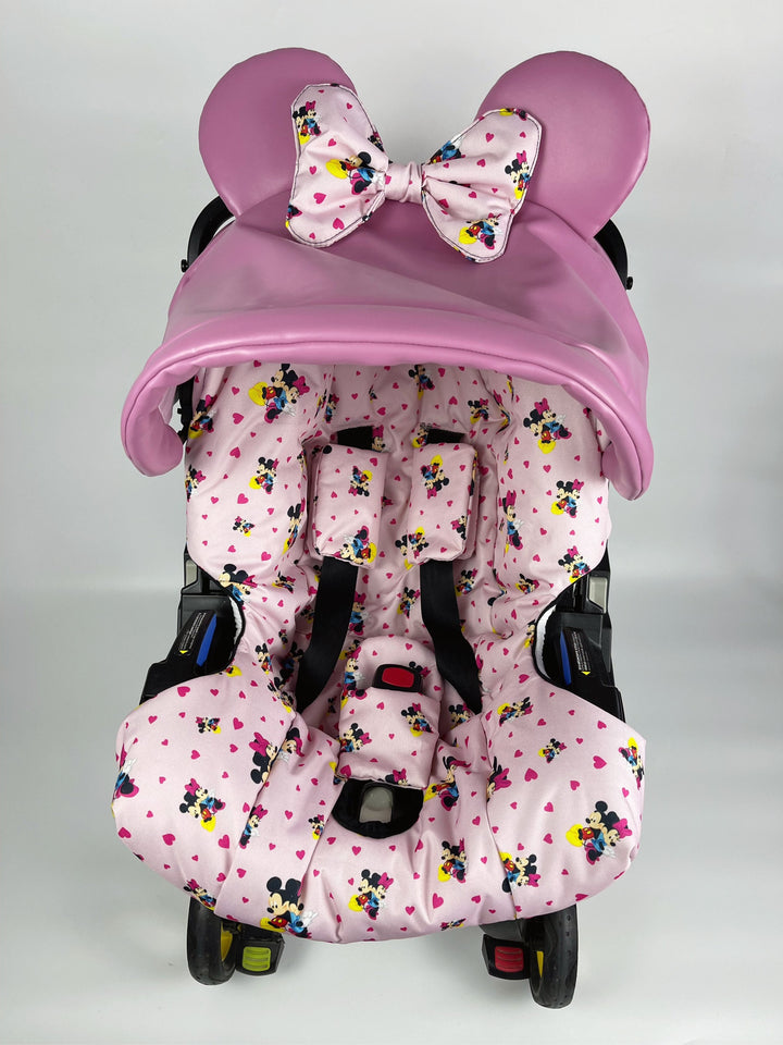 Housse de siège auto rose Minnie Mouse Doona pour bébé fille