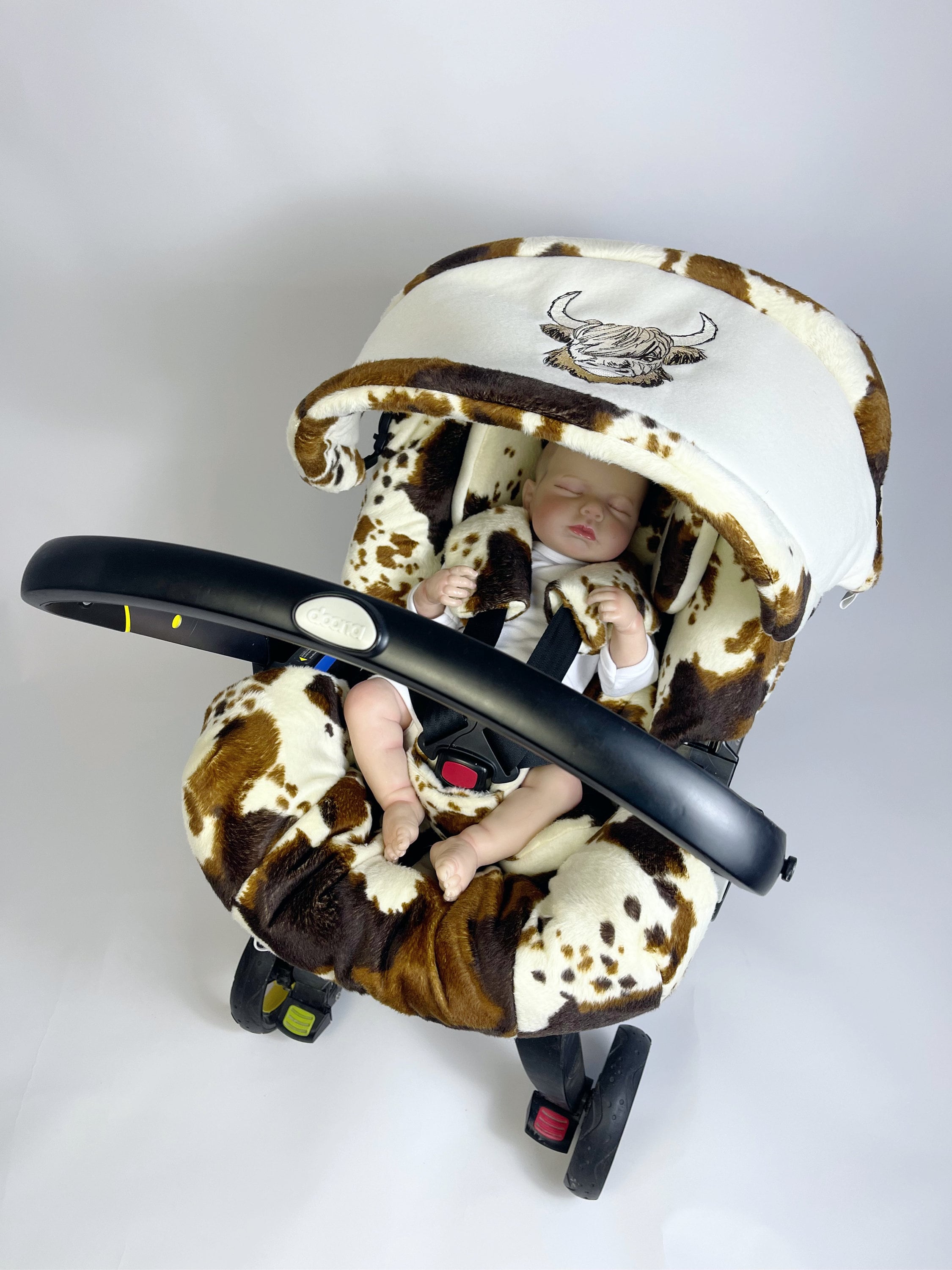 Cow print baby car seat hotsell